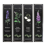Four black boxes of incense sticks with botanical illustrations and names on a white background