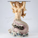 Glass topped mermaid table. Mermaid has blond hair and a pink tail, sitting on waves. Seashell bra.