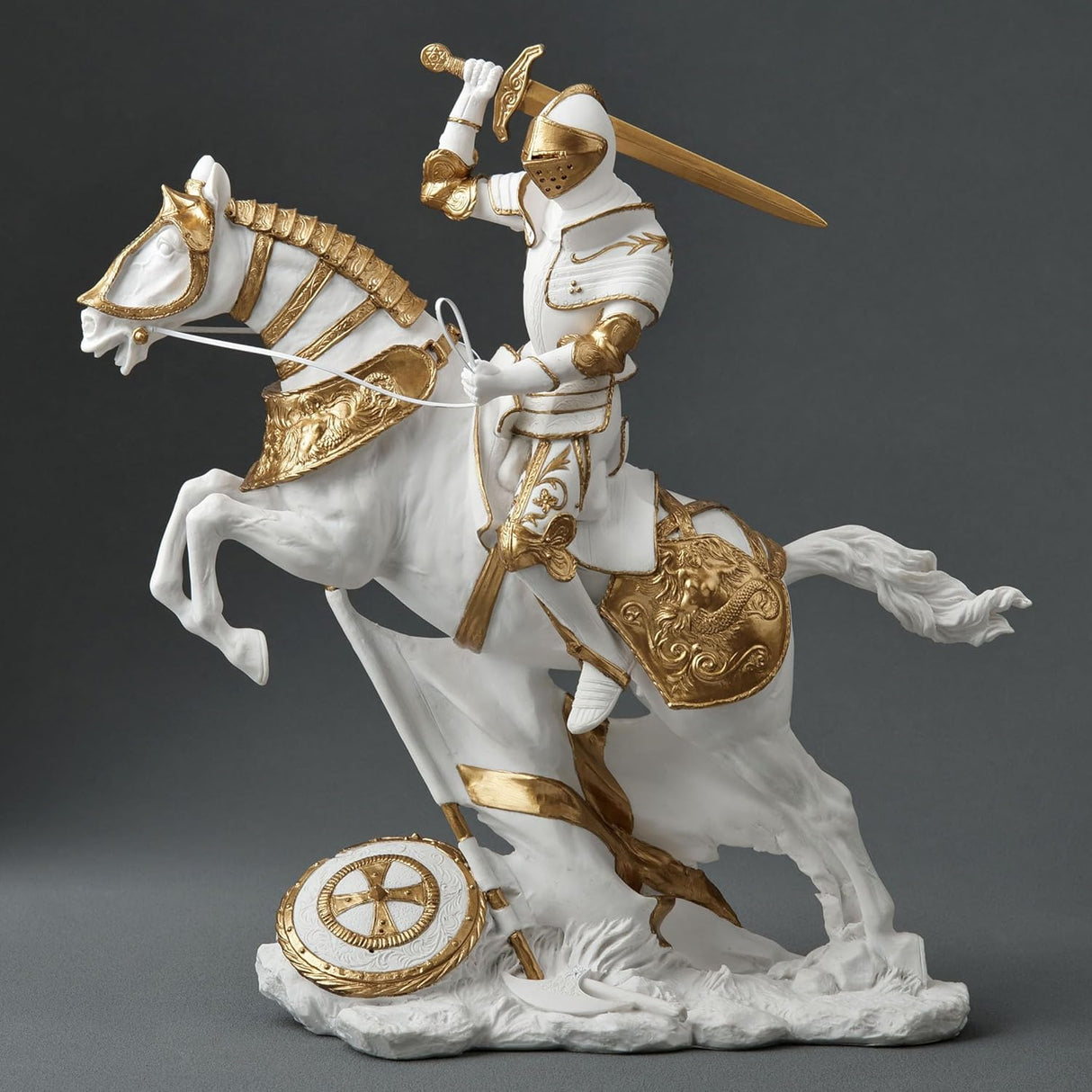 Statue of a knight on horseback with armor and sword, white and gold color scheme.
