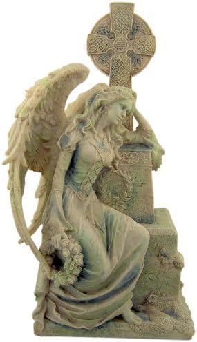 FIgurine of a gothic weeping angel leaning against an ornate gravestone with Celtic cross