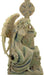FIgurine of a gothic weeping angel leaning against an ornate gravestone with Celtic cross