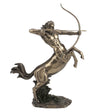 Bronze statue of a centaur with a bow on a white background