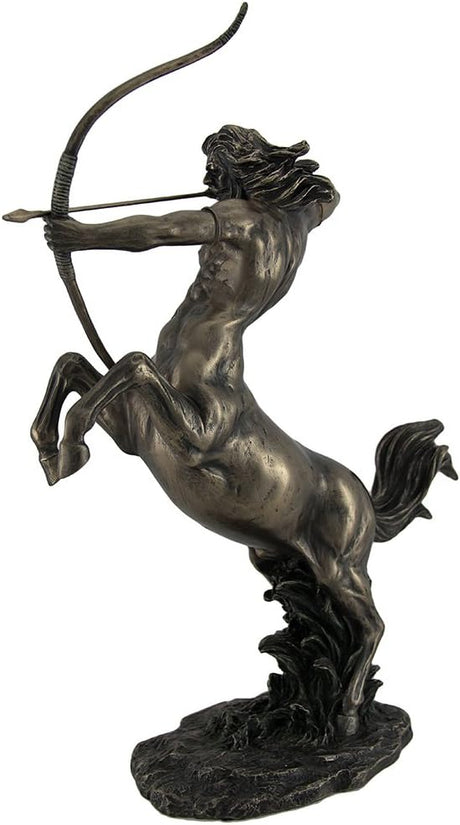 Bronze statue of a centaur with a bow on a white background
