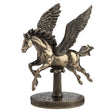 Bronze statue of a Pegasus on a white background