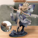Where Moonbeams Fall figurine by Josephine Wall, showing closeup of face and colored resin statuette, blond with blue accents
