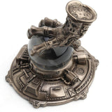 Steampunk faux-metal dragon claw grasping a crystal ball on a control panel stand