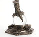 Steampunk faux-metal dragon claw grasping a crystal ball on a control panel stand