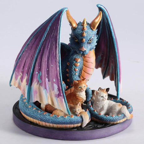 Blue, purple and gold dragon curled around five orange and white kittens