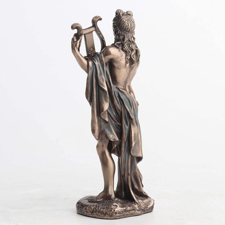 Bronze statue of Apollo holding a lyre, shown from the back
