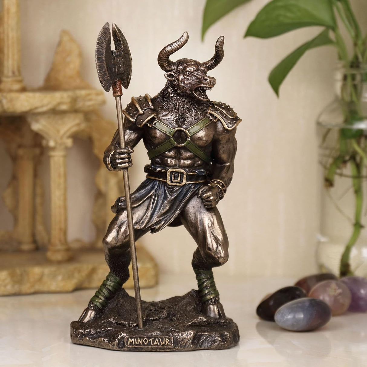 Bronze statue of Minotaur, the bull-headed warrior holding an axe