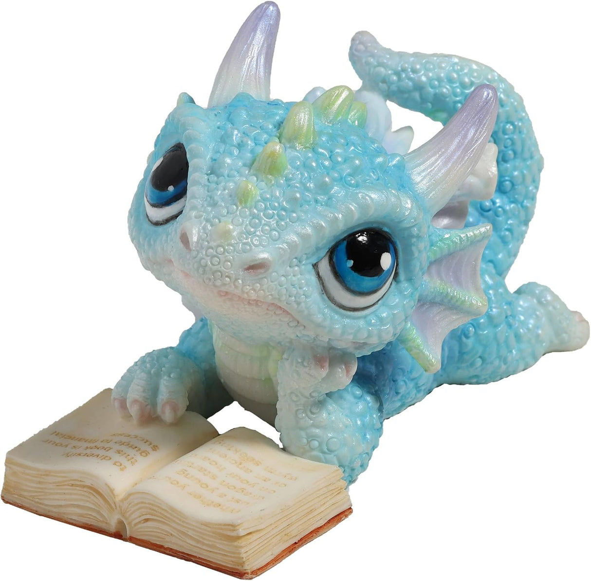 Blue dragon figurine with an open book