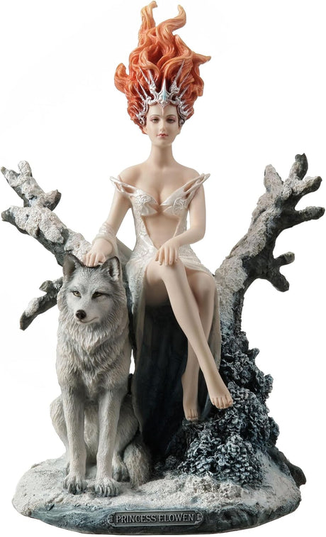 Statue of a woman with red hair and a wolf in a snowy landscape
