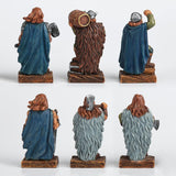 Set of six decorative Viking figurines in various poses with weapons, shown from the back