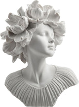 White bust of a woman with flowers for hair