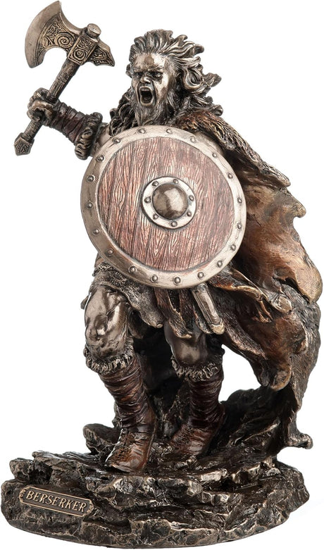 Statue of a Viking warrior holding a shield and axe 