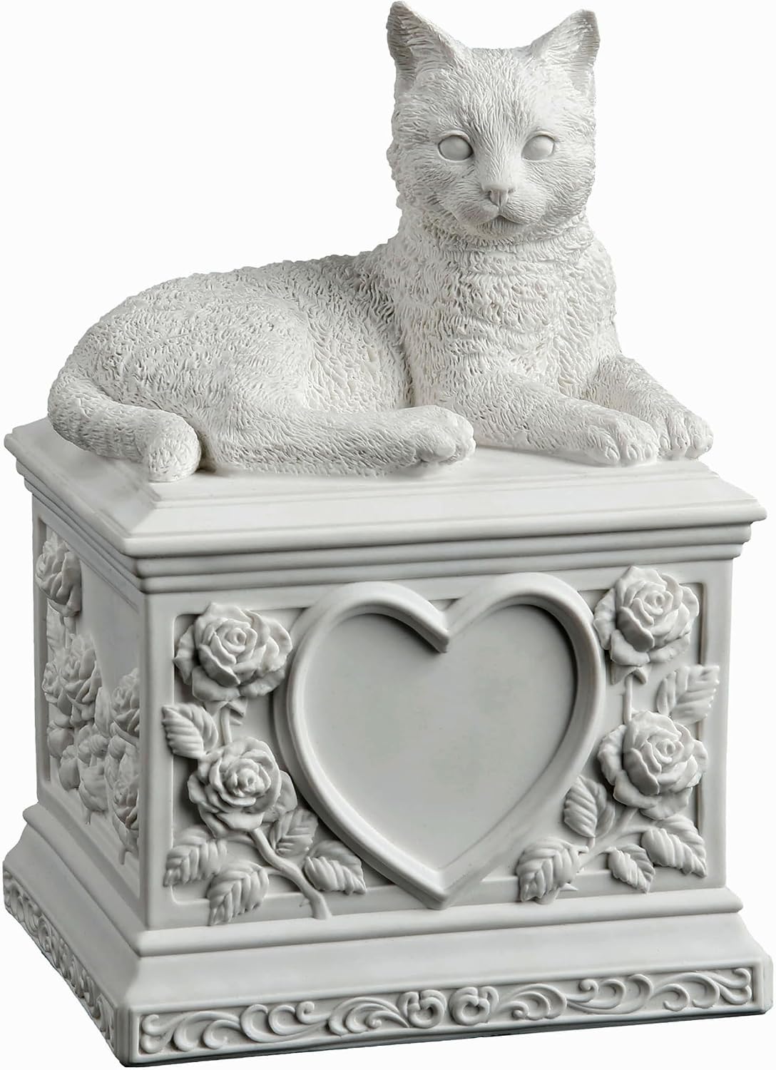 A white cat cremation urn featuring a detailed cat figurine resting on a square pedestal decorated with a central heart-shaped recess and embossed floral rose motifs.