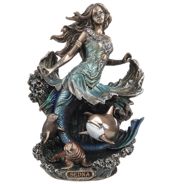 Statue of a mermaid goddess with whale, seal and walrus, and the name 'Sedna' 