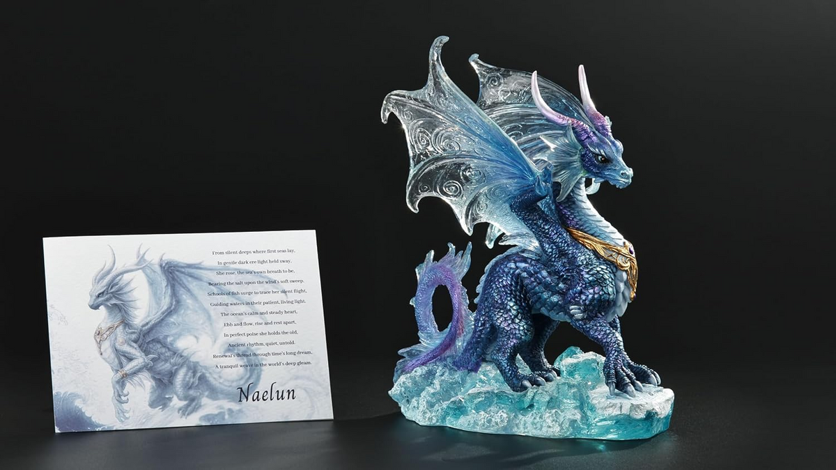 Figurine of blue dragon standing in the ocean waves with info card