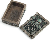 Decorative box with a Cthulhu design, shown open