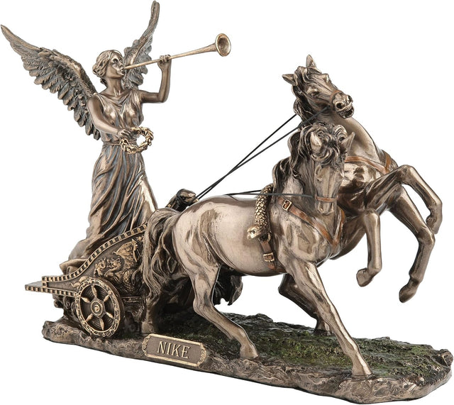 Faux Bronze statue of Greek goddess Nike on chariot pulled by two horses, blowing a trumpet