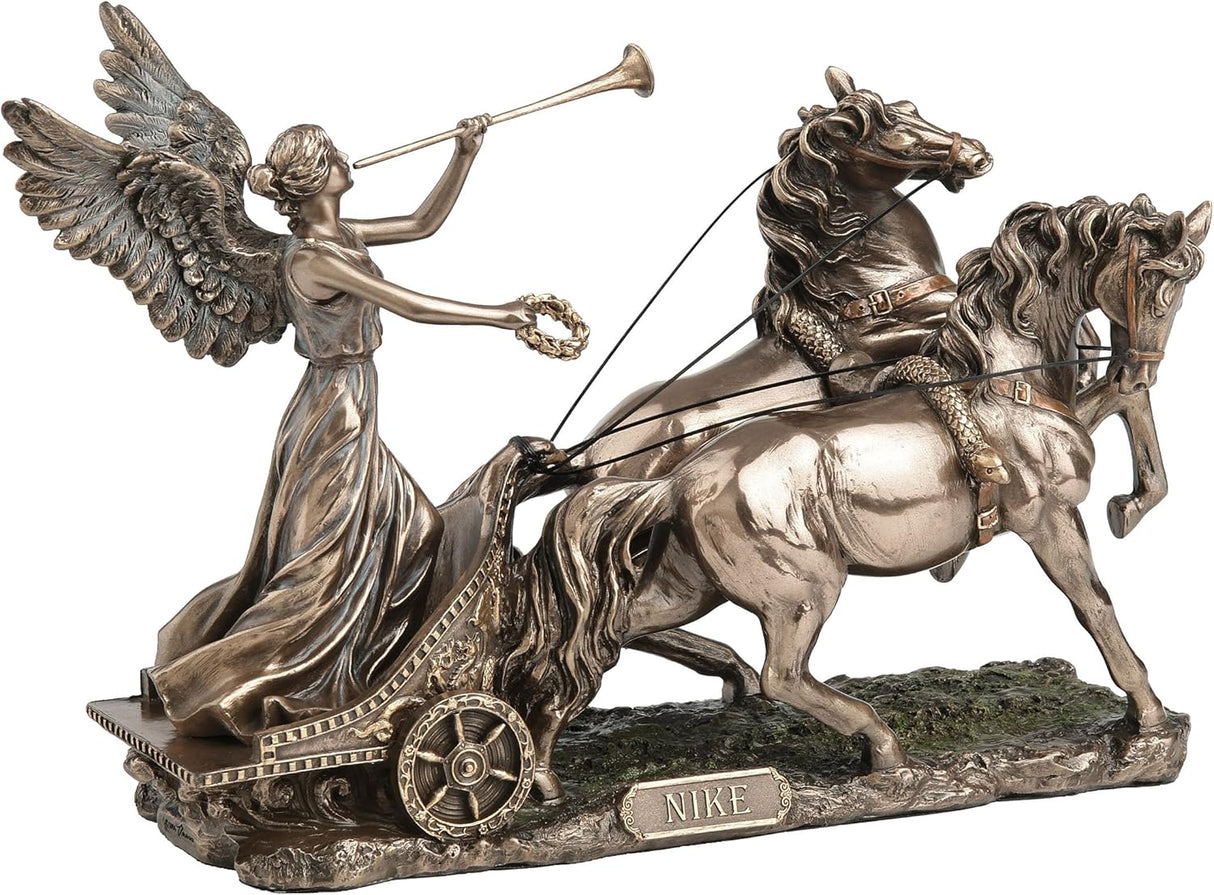 Faux Bronze statue of Greek goddess Nike on chariot pulled by two horses, blowing a trumpet
