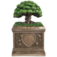 Bronze-hued urn with Tree of Life on top. Heart and swallows along the sides