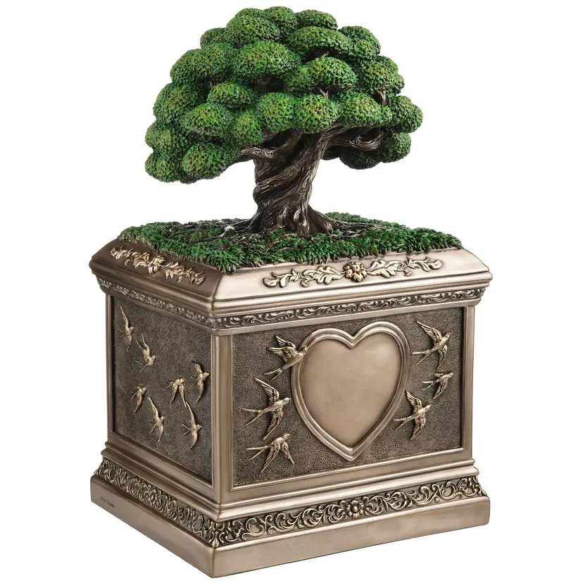 Bronze-hued urn with Tree of Life on top. Heart and swallows along the sides