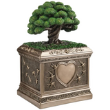 Bronze-hued urn with Tree of Life on top. Heart and swallows along the sides