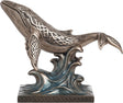 Decorative bronze-hued whale with Celtic knot designs figurine