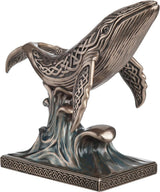 Decorative bronze-hued whale with Celtic knot designs figurine