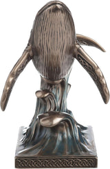Decorative bronze-hued whale with Celtic knot designs figurine