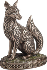 Bronze fox figurine with intricate Celtic knot patterns on a white background