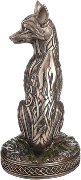 Bronze fox figurine with intricate Celtic knot patterns on a white background