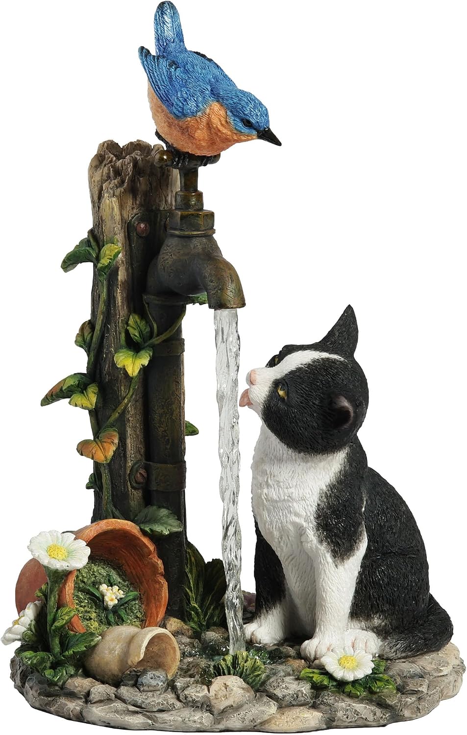 Figurine of cat drinking from garden faucet with bluebird perched on spigot