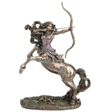 Statue of a female centaur with a bow on a white background