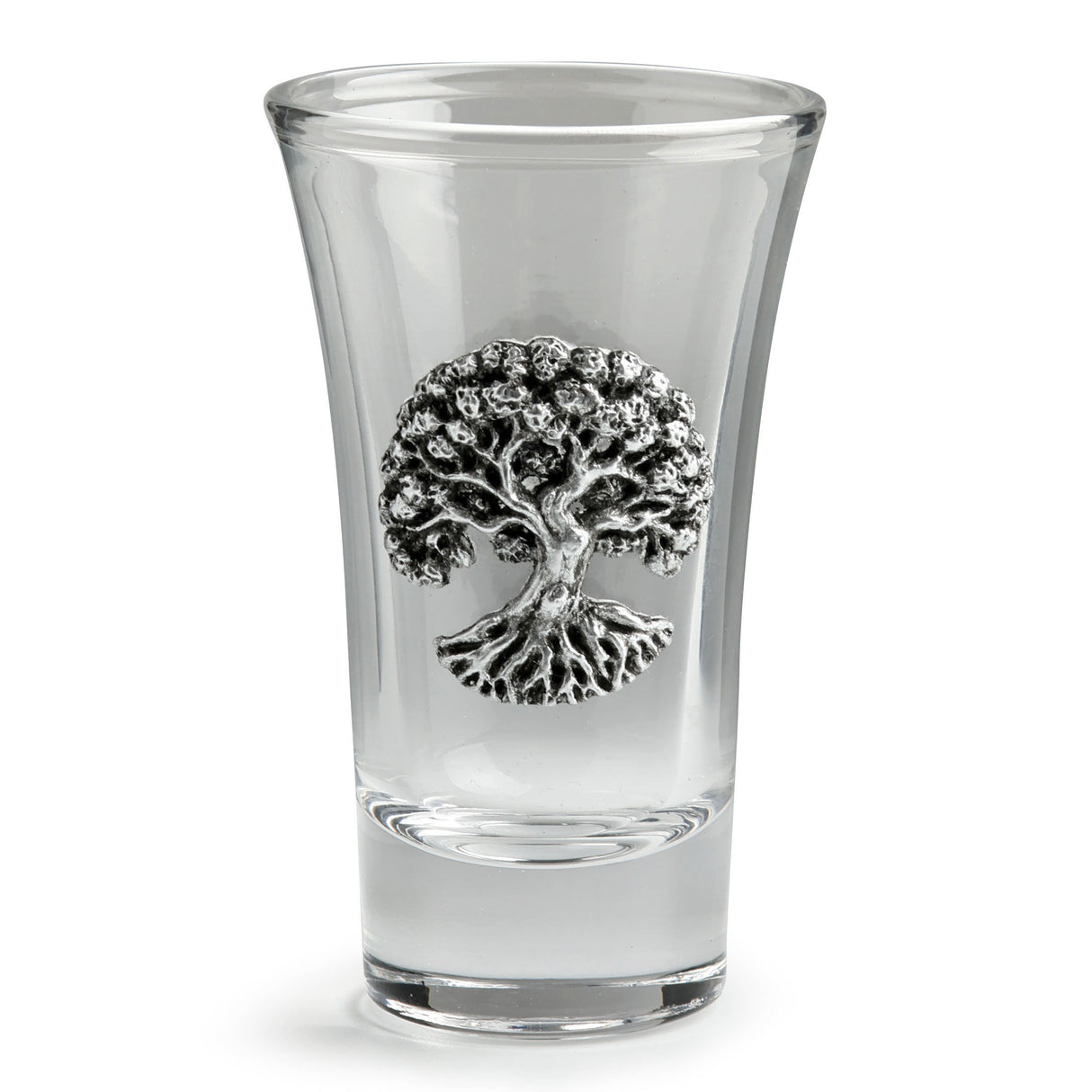 A clear glass shot glass featuring a detailed pewter tree of life emblem