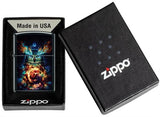 Zippo lighter with colorful owl design in a black box, featuring the Zippo logo.
