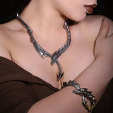Woman wearing dragon jewelry
