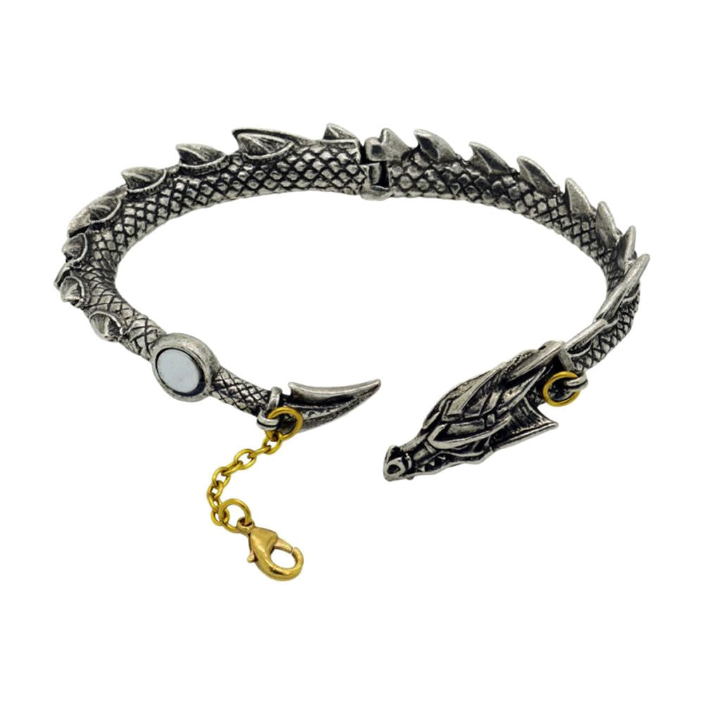 Pewter dragon bracelet with a gold chain on a white background