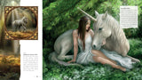Example pages of book showing woman in a white dress sitting with a unicorn in a forest setting