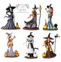 Set of witch figurines with different hairstyles and outfits on a white background, featuring the artist 'Amy Brown'.