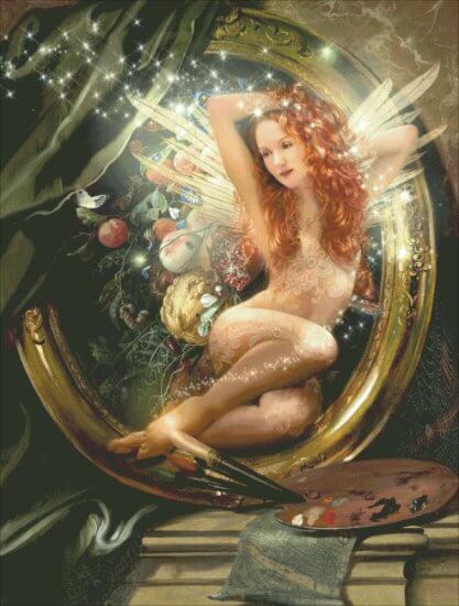 Artist's Muse cross stitch pattenr of fairy in a frame, red hair and covered in lacy patterns