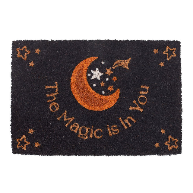 Black doormat with orange moon and stars design and 'The Magic is in You' text.
