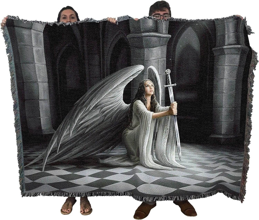 Angel tapestry blanket held up by two adults to show large size