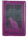 Leather notebook cover showing a cat sitting on a windowsill with birds, tree, flowers beyond. Shown in orchid purple.