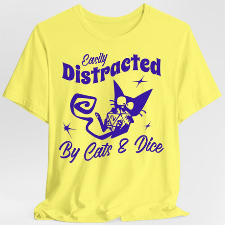 Yellow t-shirt with purple graphic and text 'Easily Distracted By Cats & Dice' on a light gray background