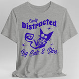 Gray t-shirt with purple graphic and text 'Easily Distracted By Cats & Dice' on a white background