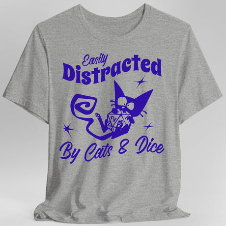 Gray t-shirt with purple graphic and text 'Easily Distracted By Cats & Dice' on a white background