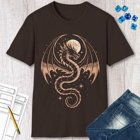 Brown t-shirt with a dragon design on a wooden surface with jeans and dice.