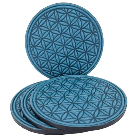 Set of 4 leather coasters in Flower of Life repeating design, shown in blue